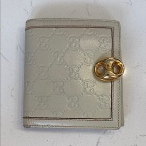 Gucci Designer Embossed Leather Wallet with Gold Accent